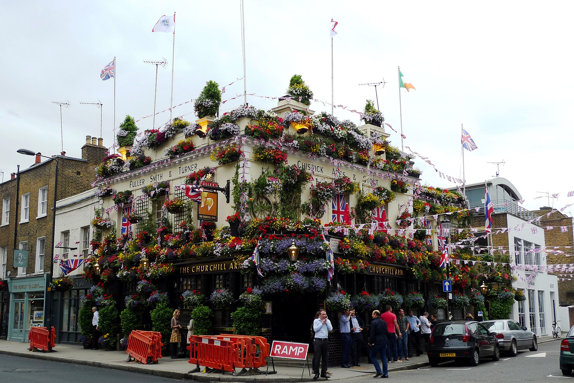 The flower-clad Churchill Arms pub in Kensington, west London