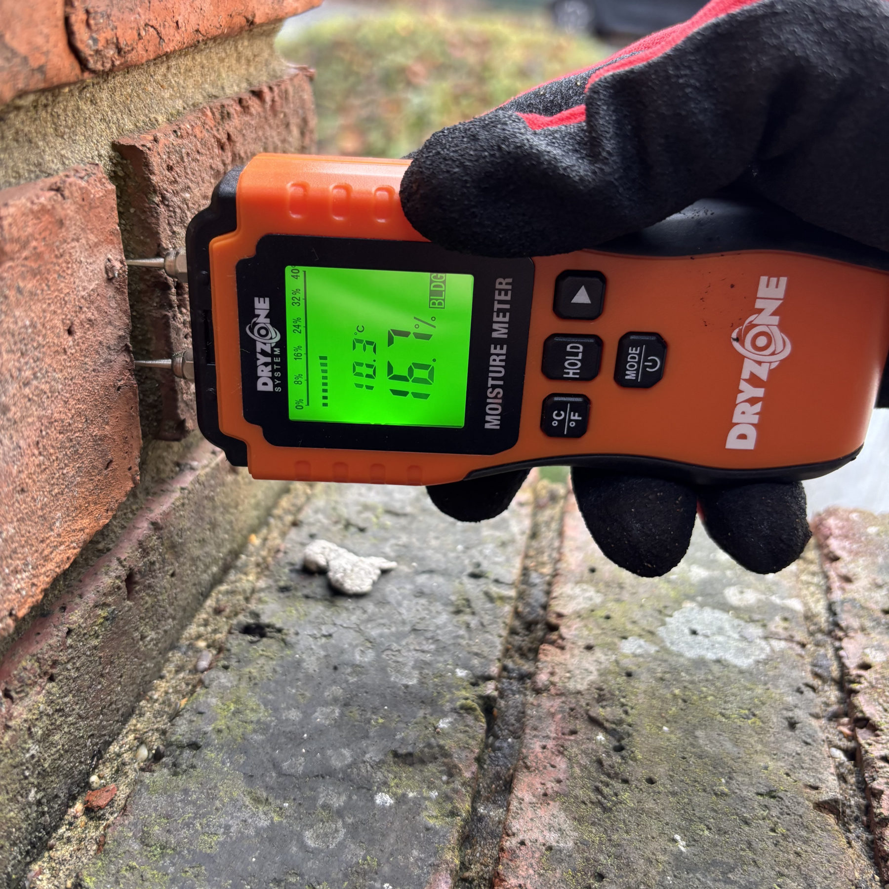 Moisture measurement of external brickwork during a combined damp and timber survey